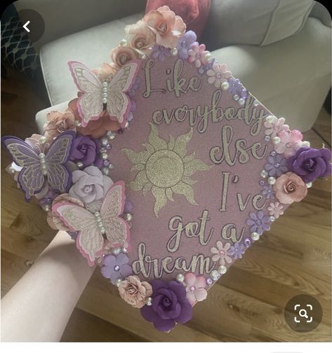 Decorating Your Graduation Cap, Repunzle Graduation Cap, Tangled Inspired Graduation Cap, Graduation Cap Rapunzel, Cap Decoration Graduation Butterfly, Graduations Caps Ideas, Tangle Graduation Cap, Repunzal Graduation Cap, Cap And Gown Cap Decorations