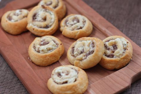 Sausage and Boursin Pinwheels - Erica's Recipes Boursin Pinwheels, Crescent Roll Sausage, Pilsbury Crescent Rolls, Boursin Appetizers, Cheese Crescent Roll Recipes, Crescent Roll Recipe, Sausage Pinwheels, Cheese Pinwheels, Cheese Crescent Rolls