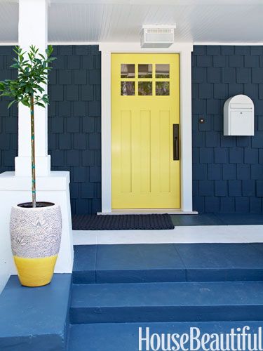 "I wanted to lighten up a dark, modest Craftsman house with a pop of yellow on the front door. Yellows can often be too juvenile, too in-your-face, too much, but the little bit of lime in this one makes it more sophisticated. It's playful and happy but not too Disney. Do it in high gloss for depth." -Tamara Kaye-Honey. Casava 15-10 by Pratt & Lambert Yellow Front Door, Designer Paint Colors, Yellow Front Doors, Best Front Doors, Door Paint, Front Door Paint Colors, Yellow Door, Door Colors, Blue Exterior