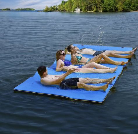 This swim water pad is made of highquality 3-layer XPE foam, which provides superior stability and comfort on water. You can relax your head on the pillow (9 ft only) and allow cooling water pad cradles your body just below the surface of the water, keeping you cool on hot summer days. This versatile swim platform can be used as a lounge, swim raft,or a launch pad for any water sports. Amazon affiliate link below: Floating Mat, Good Gifts For Parents, Pool Mat, Water Pad, Pool Rafts, Water Mat, Floating Water, Floating Island, Roll Pillow