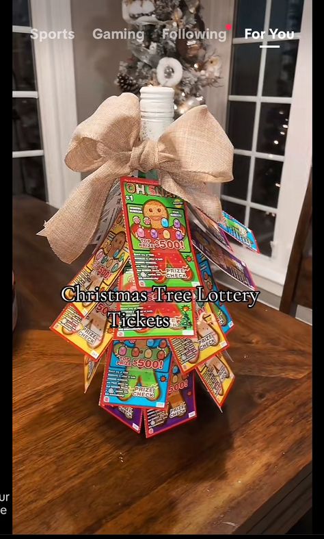 Lottery Tree Ideas, Lottery Ticket Christmas Gift, Lottery Ticket Tree, Office Holiday Party Ideas, Lottery Ticket Bouquet, Wine Bottle Christmas Tree, Lottery Ticket Gift, Best White Elephant Gifts, Lottery Ticket