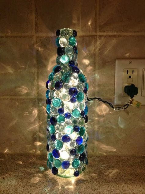 Bottles do not need to be thrown once you empty them. These bottles can be recycled, reused or made into these beautiful crafts. So get those hands and mind ready for the amazing glass bottle crafts that follow. 1. illuminate your room with this crystal studded bottle light Source 2. no place like h-o-m-e Source Add aRead more Wine Bottle Project, Diy Lampe, Wine Craft, Wine Bottle Art, Wine Bottle Diy, Lighted Wine Bottles, Glass Bottle Crafts, Halloween Craft, Bottle Lamp