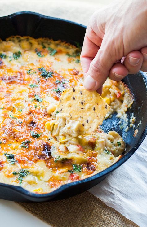 Skillet White Chicken Chili Dip | March Madness appetizer! Hearty chicken chili all bubbly in a skillet. gluten-free White Chicken Chili Dip, Chicken Chili Dip, Gluten Free Appetizer Recipes, Gluten Free Appetizer, Chili Dip, Iron Skillet Recipes, Hearty Chicken, Cast Iron Recipes, Buffalo Chicken Dip