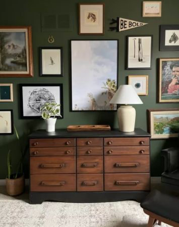 Gallery Wall Green Walls, Gallery Wall Over Crib, Corner Gallery Wall Ideas, Outdoorsman Nursery, Boys Room Gallery Wall, Dark Green Kids Room, Moody Gallery Wall Ideas, Moody Boys Bedroom, Kids Room Gallery Wall