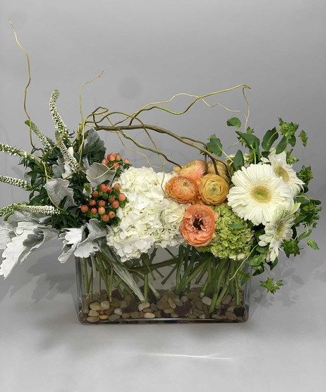 A wonderful arrangement of fresh flowers and textures arranged in a sleek rectangle vase. This statement piece will bring style to any room! Thanksgiving Floral Arrangements, Rectangle Vase, Floral Designs Arrangements, Table Floral Arrangements, Thanksgiving Floral, Floral Arranging, Fall Flower Arrangements, Fall Floral Arrangements, Flower Business