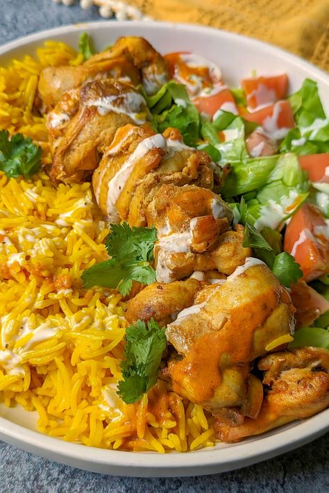 A plate of chicken and rice. Halal Chicken And Rice Recipe, Halal Guys Rice Recipe, Healthy Halal Recipes, Chicken Over Rice Recipes Halal, Halal Guys Recipe, Halal Chicken And Rice, Halal Guys, Halal Chicken, Chicken Over Rice