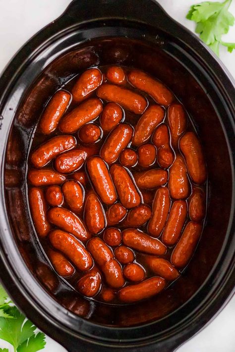 These easy 3-ingredient little smokies are cocktail sausages cooked in a sweet and tangy barbecue sauce in the slow cooker. They are perfect for parties and entertaining as they're so tasty and fun to eat, and everyone loves them! Cocktail Sausage Recipes, Lil Smokies Recipes, Crockpot Little Smokies, Cocktail Weenies, Little Smokies Recipes, Easy Delicious Appetizers, Smokies Recipe, Lil Smokies, Little Smokies