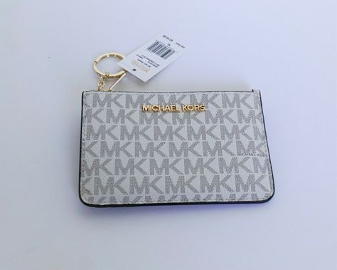 NEW WITH TAG Michael Kors Jet Set Travel Small Top Zip Coin Pouch with ID Key Holder  MK Signature  PVC Leather  Vanilla/Brown 100% Authentic  Retail: $ 118 Plus Tax  Gold Toned Hardware 2 Card Slots, ID Window at Back 1 Slip Pocket  Zip Top Closure Custom Fabric Lining 1 Key Holder 5.25"(L) X 3.5"(H) X 0.25"(D) Very Clean, Smoke-Free and Pet-Free Environment. Michael Kors Items are from An Authorized Michael Kors Store and I am not affiliated with Michael Kors. International buyers are responsi Michael Kors Card Holder, Michael Kors Store, Bling Car, Bling Car Accessories, Mk Wallet, Small Pouch, Keychain Wallet, Junior Year, Michael Kors Wallet