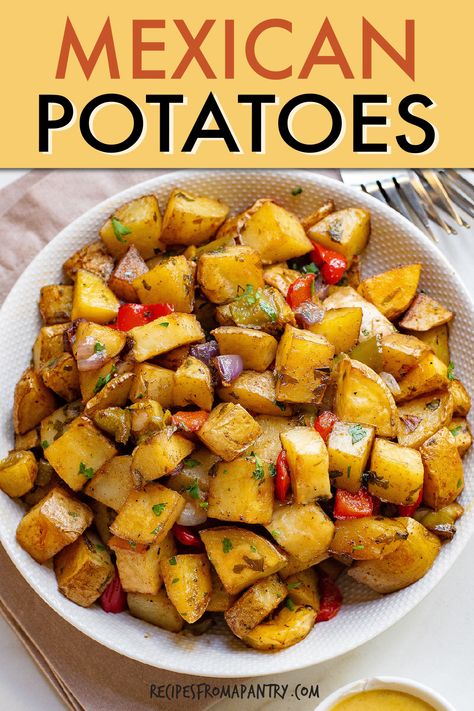 Mouthwatering Mexican Potatoes made with onions, peppers, and cilantro are a tasty twist on traditional potato side dishes. Roasted to perfection, they offer a zesty and satisfying addition to any meal. These baked Mexican potatoes are quick and easy to make for weeknight dinners, parties, and bringing to potlucks. Customize with your favorite toppings and enjoy the burst of Mexican flavors in every bite. Click through to get this awesome Mexican potatoes recipe!! #mexicanpotatoes #mexicanfood Enchiladas Sides, Sides For Enchiladas, Sides For Fajitas, Sides For Tacos, Tacos Sides, Mexican Potatoes, Mexican Brunch, Taco Side Dishes, Party Side Dishes