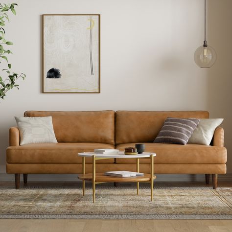 Take a seat in the lap of luxury with the Chloris 90-inch Sofa. This couch has a clean, mid-century modern style that will add a relaxed sophistication to your living room. Oversized Loveseat, Wide Sofa, Genuine Leather Sofa, Mid Century Modern Sofa, Brown Cowhide, Mid Century Sofa, Comfy Couch, Leather Couch, Brown Sofa