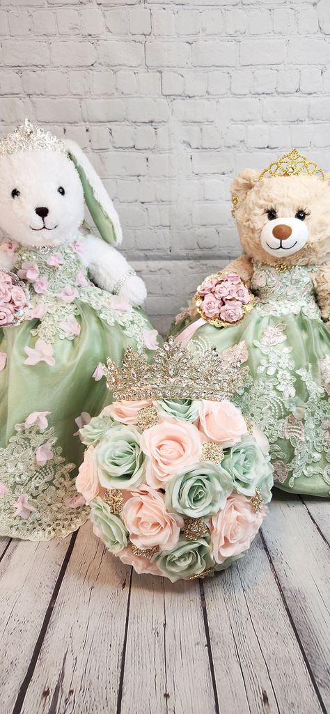 "Custom Personalized Quinceanera Bear/Last Doll/Oso made to look just like the quinceanera's dress. Attention to detail is my forte.  Includes the 20\" bear, dress, tiara, lashes, bouquet and jewelry. Please allow more than 8 weeks to make the bear.  May be longer during peak season.  Please message me with the following information: - Pictures of the front and back of the dress. - Color description as sometimes the pictures may appear differently.  - Date of the Quinceanera - Color of accessori Enchanted Forest Theme Quinceanera Damas, Chanted Forest Theme Quince, Sage Green Quince Doll, Sage Green And Blush Pink Quinceanera Theme Decor, Pink And Sage Green Quinceanera, Sage Green And Pink Quince, Last Doll Quinceanera, Sage Green And Pink Quinceanera Theme, Green And Pink Quinceanera