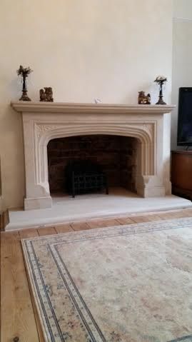 Carved stone fireplace surround- sandstone Stone Fire Surround, Manor Fireplace, Fireplace Sandstone, Castle Fireplace, Castle Gatehouse, Natural Stone Fireplace, Carved Stone Fireplace, Sandstone Fireplace, Craftsman Fireplace