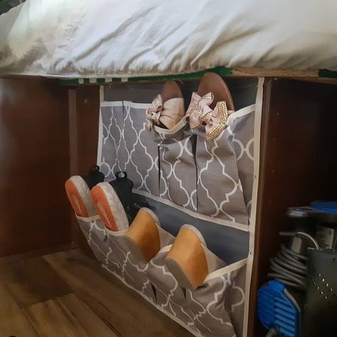 10 Creative RV Bedroom Organization Ideas! — Cool Mom and Collected Rv Shoe Storage Ideas, Over Bed Shelf, Rv Shoe Storage, Rv Storage Ideas, Campsite Decorating, Rv Life Hacks, Bed Shelf, Travel Trailer Organization, Wire Closet Shelving