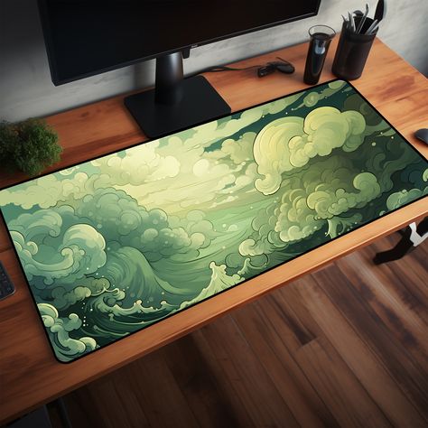 Are you looking for a desk mat that combines cottage core and anime aesthetics? You will love this cottagecore desk mat, a green desk mat that features a whimsical design of turbulent waves and clouds. This desk mat is perfect for adding some charm and personality to your desk, whether you use it for work, study, or gaming. This desk mat is made of high-quality neoprene material, which is durable, smooth, and comfortable. The desk mat has a non-slip rubber base, which prevents it from sliding or moving on your desk. The desk mat also has a stitched edge, which prevents it from fraying or peeling. This desk mat comes with 3 sizes. It can fit your keyboard, mouse, laptop, and other desk accessories. You can also use it as a mouse pad, a writing pad, or a drawing pad. The desk mat is easy to Cute Mousepad, Anime Elements, Clouds Cute, Green Desk Mat, Cottagecore Desk, Japanese Desk, Mat Aesthetic, Anime Magic, Iconic Anime