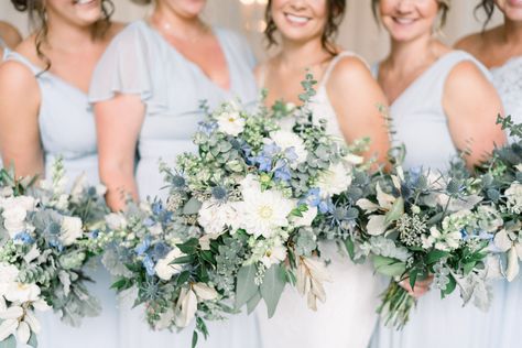 Loose, natural, organic, and lush bouquets with an overall color scheme of white, ivory, greens, and subtle pops of dusty blue/gray used throughout. Blooms include white roses, white lisianthus, white maj spray roses, white stock, white ranunculus, white spirea, and other complimenting blooms. Greenery includes salal, italian ruscus, mini pitt, baby blue eucalyptus, eucalyptus, and other complimenting textures. White Spirea, Bridal Bouquet Green, Beach Wedding Pics, White Flower Centerpieces, Blue Bouquets, Baby Blue Eucalyptus, Bride Bouquets White, Blue Wedding Centerpieces, Blue Eucalyptus