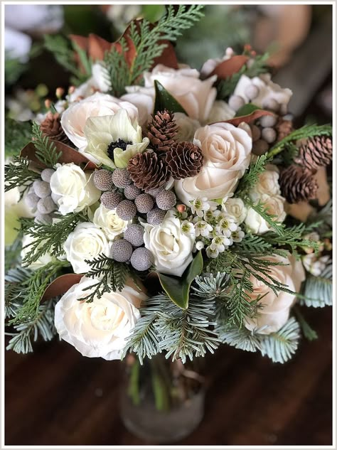 Winter Wedding Bouquet - Stay on top of the latest and greatest deal. Click to visit TODAY! White Roses And Pine Cones, Pine Wedding Bouquet, Winter Wedding Floral Arrangements, December Wedding Flowers, White Winter Flowers, Pine Cone Bouquet, Winter Wedding Flowers Bouquets, Winter Woodland Wedding, Winter Wedding Florals