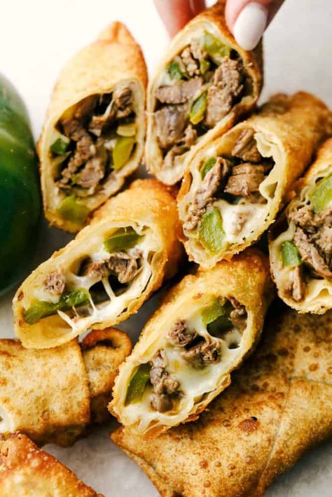 Philly Cheesesteak Egg Rolls, Steak And Cheese, Egg Roll Ingredients, Egg Roll Wraps, Homemade Egg Rolls, Sauteed Peppers And Onions, Cheese Steak, Egg Roll Recipes, Egg Roll Wrappers