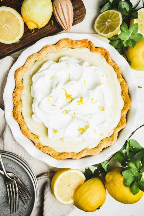 Delicious Sour cream lemon pie recipe made with a no-bake slightly tart and highly creamy lemon filling on a flaky, buttery pie crust topped with whipped cream. This recipe is easy and flavorful perfect for this summer. #lemonpie #lemoncreampie Lemon Pie With Condensed Milk, Sour Cream Lemon Pie Recipe, Lemon Pie Recipe Condensed Milk, Sour Cream Lemon Pie, Pie With Condensed Milk, No Bake Lemon Pie, Lemon Sour Cream Pie, Pie Crust Top, Cream Pie Filling