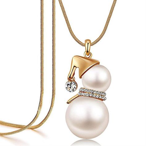 PRICES MAY VARY. Our snowman body is made of two simulated pearls of varying sizes to look like a realistic snowman necklace.Necklace length is about 71cm/27.95inch Pendant size is about 4.3*2cm/1.69*0.79inch. A highly polished women's gold silver Christmas necklace with a golden sheen around the alluring neck for a radiant look. Excellent snowman pendant design, strong chain is not easy to break, with lobster clasp. The simple women's snowman pendant long necklace clings to your beautiful neck Holiday Jewelry Pearl, Cheistmas Necklace, Snowman Made With Pearls, Christmas Jewelry Creative Ads, Christmas Jewelry Ads, Pearl Jewelry Gift, Christmas Necklace, Pearl Jewelry Wedding, Big Pearl