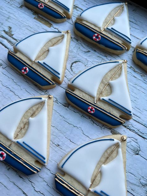 12 vanilla sugar cookies- boat only- size, colour and design may vary. Sailboat Cookies Decorated, Nautical Cookies Decorated, Coastal Cookies, Nautical Party Food, Sailboat Cookies, Nautical Cookies, Specialty Cookies, Cookies Summer, Twins Party