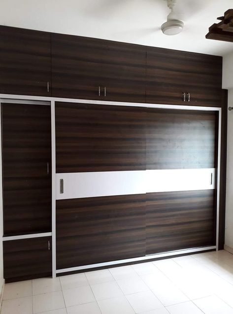 #wardrobe it's beautiful design brown and white combination and double sliding door and up open Hindi store beautiful design and white water if you need more design and more information open my Pinterest profile and follow me on Pinterest Karan Jangid thank you Wodrob Design Bedroom Sliding, Cupboard Ideas Bedroom, Wardrobe Laminate Design, Double Sliding Door, Sliding Door Wardrobe Designs, Wall Wardrobe Design, Modern Cupboard Design, Wardrobe Door Designs, Wardrobe Designs