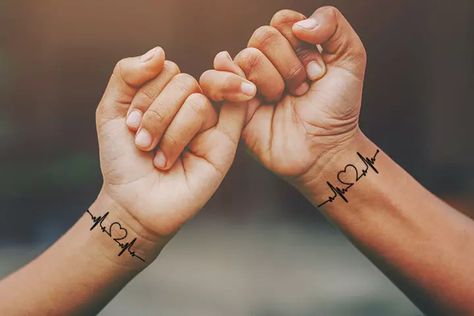 Couple tattoos are a great way to showcase your love and affection for each other. Check out these tattoo ideas and symbolize your love perfectly. Couples Hand Tattoos, Lifeline Tattoos, Finger Tattoos For Couples, Puzzle Piece Tattoo, Pretty Flower Tattoos, Wife Tattoo, Cute Matching Tattoos, Vogel Tattoo, Forever Tattoo