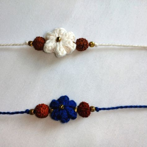 Cotton Floral Rakhi - Lot Of 2: 1 Blue Bracelet & 1 White Bracelet. Nwot. Crochet Using Cotton Threads And Brass Beads. Tassels On Both Ends. Pretty And Soft On Your Arm. Raksha Bandhan / Rakhi For Blessings For Protection And Wellbeing! Crochet Rakhi, Raksha Bandhan Rakhi, Beads Tassels, Handmade Rakhi, Crochet Beaded Bracelets, White Bracelet, Brass Beads, White Bracelets, Raksha Bandhan