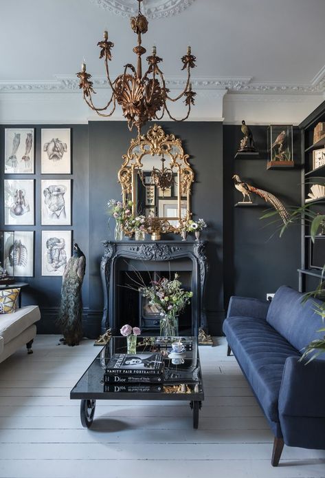 This five-bedroom, double-fronted Victorian house can be found in southwest London. A little bit macabre, a little bit moody; that’s the vibe of this modern gothic home. This is about more than adding a coat of Down Pipe to the walls and buying a fancy chandelier. The house is full of design decisions that, in fashion terms, take it from the equivalent of a ready-to-wear dress to a couture creation. #Gothic #fivebedroomhome #couturecreation Gothic Living Room Ideas, Gothic Living Rooms, Dark Living Room Ideas, Gothic Living Room, Gothic Interior, Baroque Decor, Victorian Home Decor, Dark Living Rooms, Modern Gothic