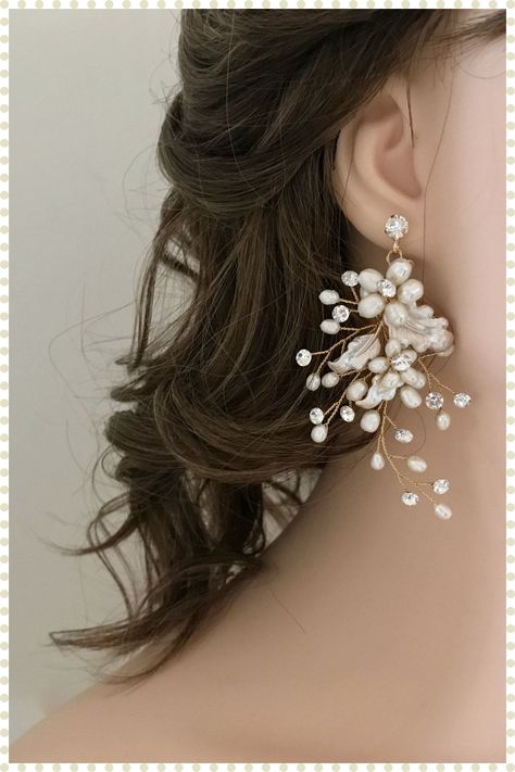 [PaidLink] 'Boho Chic Floral Statement Earrings Beautifully Detailed With Dainty Freshwater Pearls And Sparkling Crystals. These Stunning Earrings Will Add An Elegant Touch To Your Wedding Look And Are Also Lovely For Special Occasion Wear. Ready To Ship Details * Measures 1.75' Wide By 3.25' Long * Lightweight * Offered In Gold, Silver And Rose Gold * Matching Combs And Hairvines And Bracelet Bridal Jewelry: #bridalstatementearringsboho Long Wedding Earrings, Wedding Earrings Pearl, Boho Wedding Earrings, Bridal Jewellery Inspiration, Bridal Statement Earrings, Zoo Wedding, Crystal Bridal Earrings, Pearl Earrings Wedding, Wedding Look