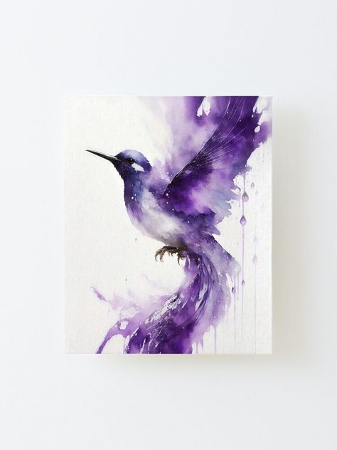 Watercolor painting of a purple hummingbird. Perfect for decorating your spaces, creating a luxurious, sophisticated, and relaxing ambiance.

* Easy-to-hang canvas print with that airy "floating off the wall" look
* Canvas is 15/64 inch (4mm) thick with clean folded edges
* With wooden rear spacer, print stands 3/4 inch (2cm) away from the wall
* Mount directly to the wall using included 3M tabs
* No nails, screws, or holes in the wall required Purple Bird Art, Mystical Watercolor Painting, Purple Watercolor Painting, Purple Painting Ideas On Canvas, Watercolor Birds Easy, Humming Bird Watercolor, Hummingbird Watercolour, Watercolor Violets, Hummingbird Watercolor Painting