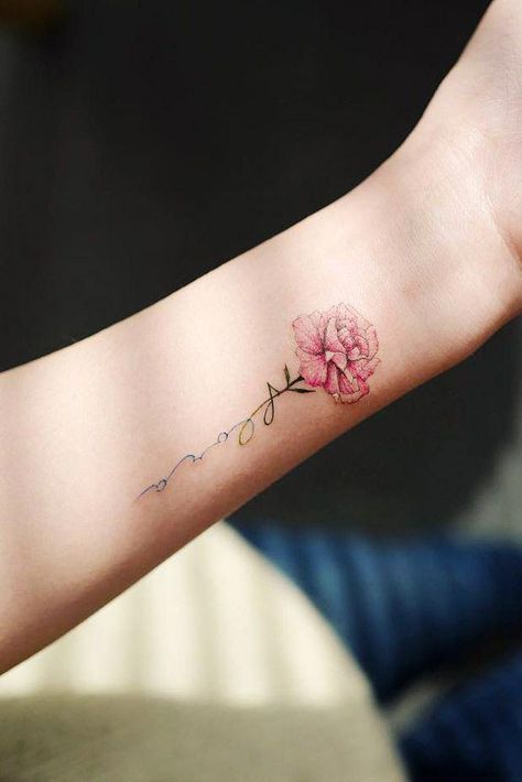 Small wrist tattoo Adversity Tattoo, Single Rose Tattoos, Carnation Tattoo, Flower Wrist Tattoos, Disney Tattoo, Small Wrist Tattoos, Rose Tattoo Design, Tattoo Feminina, Flower Tattoo Designs