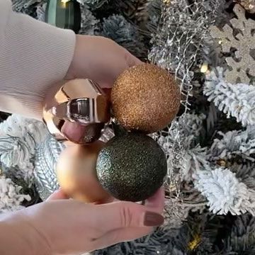 Jennie • Modern Home Design on Instagram: "A hack so simple you’ll go 🤯 I’ve been guilty in the past of using the tiny Christmas ornaments all of the tree & always wondering how I get it to look more extravagant. This year I tried using zip ties to tie together multiple small ornaments & im loving the visual interest they add to our @kingofchristmas tree! You get the large ornament look for a fraction of the price 🙌🏻 All of the ornaments on this tree are from Sam’s Club and only cost $34 for a pack of $75! To shop this exact look, comment LINK and I’ll send it your way! Make sure to save this for later this month when you’re ready to decorate! #christmastree #christmastime🎄 #kingofchristmas #treedecorating #holidayhome #holidayhomedecor #bedroomdesign https://liketk.it/4mJb0" Zip Tie Ornaments, Tiny Christmas Ornaments, Small Ornaments, Christmas Tree Baubles, I Get It, Zip Ties, Tree Ideas, Holiday Home Decor, Ball Ornaments