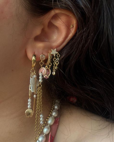 An ear stack chosen by you featuring our Jennifer’s, special edition pink Leilanis, Wren and Aim for the stars 🎀✨⭐️ #ukjewellery #jewellery #earrings #earringsoftheday #earringsofinstagram #jewellerybrand #jewellerysets #earringfashion #earringaddict #statementearrings #earringcollection #jewelleryset #jewellerybusiness #accessoriesoftheday #accessorieslover #fashionblogger #fashionaddict #lookoftheday #jewelleryofig #earringcuffs #earringcollection #hoopearrings #benekejewellery #pinteresta... Aesthetic Earring Stack, Aesthetic Earring, Aim For The Stars, Earring Stack, Ear Stack, Jewellery Earrings, Earrings Collection, Wren, Fashion Addict