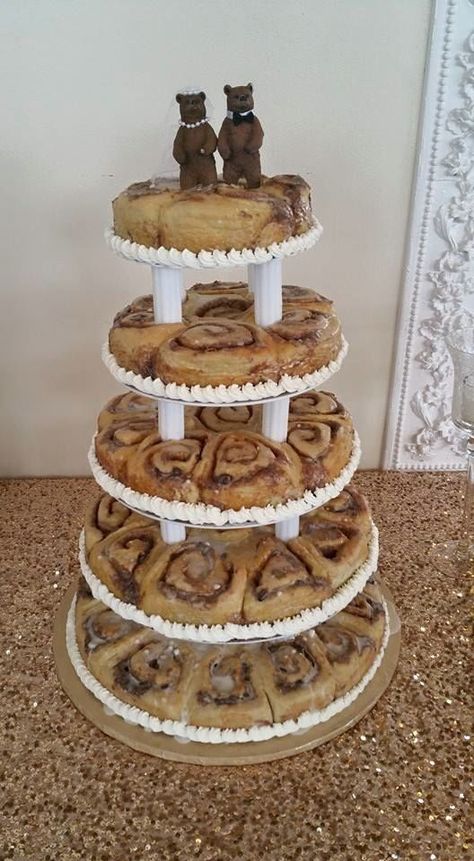 Grooms cinnamon roll cake Cinnamon Roll Tower Cake, Wedding Cinnamon Rolls, Cinnamon Rolls Wedding Cake, Cinnamon Roll Tower, Cinnamon Roll Wedding Cake, Cinnamon Roll Grooms Cake, Cinnamon Rolls At Wedding, Brunch Wedding Cake, Brunch Dessert Table