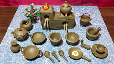 Miniature Clay House | Kitchen Set | DIY Miniature Utensils Diy, Clay Kitchen Set, Miniature Kitchen Set, Clay Kitchen, Saree Function, Cake Tables, Kitchen Sets For Kids, Fairy House Crafts, Clay Fairy