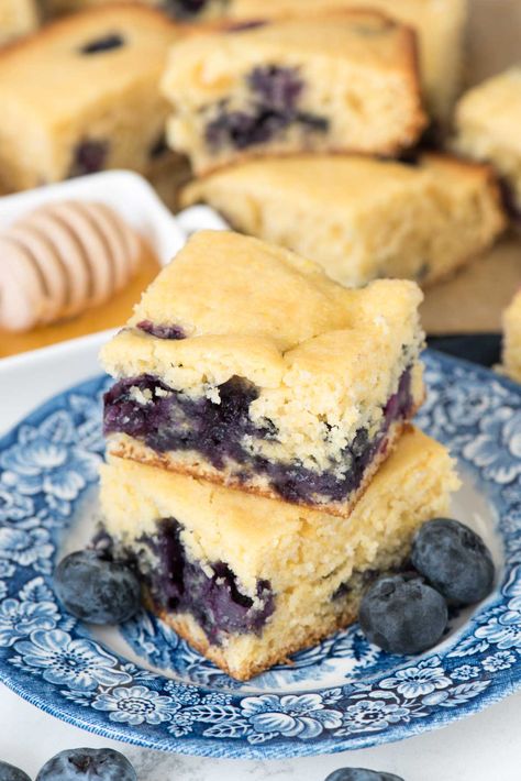 EASY Blueberry Cornbread - this cornbread recipe starts with a doctored mix. The blueberries and some added sugar make this the PERFECT breakfast or dessert recipe.