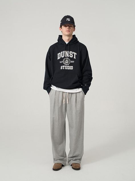 It is a straight fit wide jogger pant with leather D logo embellishment. The sweatpant features relaxed fit silhouette and pleats on the front to make stylish look. The pant can be styled in two ways using the drawstring on the hem. It has leather logo embelishment and embroidery point on the front pocket. The pant is easy to style with different items, especially sweatshirts and hoodies from the brand. - Elastic band waist- Side pockets- Back pockets- Logo label Man Joggers Outfit, Men’s Sweats Outfit, Sweat Pants Men Outfit, Sweatpants Fit Men, Sweet Pants Outfits Men, Basic Fits Men, Male Sweatpants Outfit, Mens Outfits Sweatpants, Gray Joggers Outfit Men