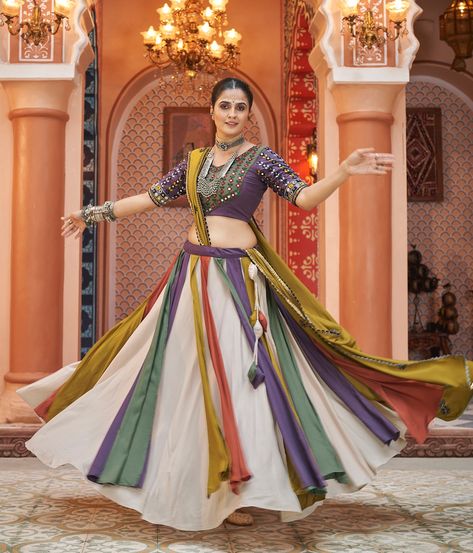 Enjoy the Navratri vibe with multi color rayon embroidery with mirror work lehenga, teamed with blouse and print with embroidery dupatta ✨⭐️ SHOP NOW 🛍️ gotifab.com [lehengacholi, garba outfits, navratri lehengas, navratri collection,navratri chaniya choli,navratri collection ] #lehengacholi #navratrilehenga #navratricollection #navratri #navratrichaniyacholi #garbaoutfit Embroidery With Mirror Work, Choli Navratri, Garba Outfit, Print With Embroidery, Embroidery Dupatta, Navratri Collection, Mirror Work Lehenga, Navratri Chaniya Choli, Work Lehenga