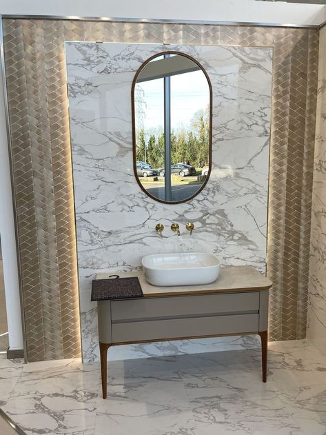 Like the tiles used here on the wall. Don't like the small mirror. Vanity unit is okay but limited in terms of storage. The veins are too pronounced on the marble'esq tile behind the mirror. Floor tiles are too busy. Tile Behind Vanity, Mirror Floor, Mirror Vanity, Small Mirror, Too Busy, Small Mirrors, Marble Tile, Vanity Unit, Vanity Units