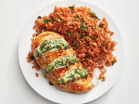 Cheesy Broccoli-Stuffed Chicken with Tomato Rice Broccoli Stuffed Chicken, Tomato Rice Recipe, Cheese Stuffed Chicken Breast, Cheesy Broccoli, Tomato Rice, Cheese Stuffed Chicken, Easy Comfort Food, Breast Recipe, Cheese Stuffed