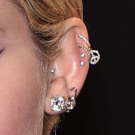 Miley Cyrus Piercings & Jewelry | Steal Her Style Miley Cyrus Ear Piercings, Miley Cyrus Piercings, Smiley Miley, Upper Lobe Piercing, Piercing Inspiration, Piercings Jewelry, Lobe Piercings, Cartilage Piercings, Steal Her Style