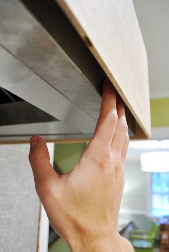 Gotcha Covered: Building A Wood Range Hood Cover | Young House Love Diy Ventless Range Hood Cover, Wood Hood Cover Kitchen, Covered Range Hood Ideas, Cooker Hood Cover, Under Cabinet Ductless Range Hood Ideas, How To Build A Range Hood, Beadboard Range Hood, Building A Range Hood Cover, Easy Diy Range Hood Cover