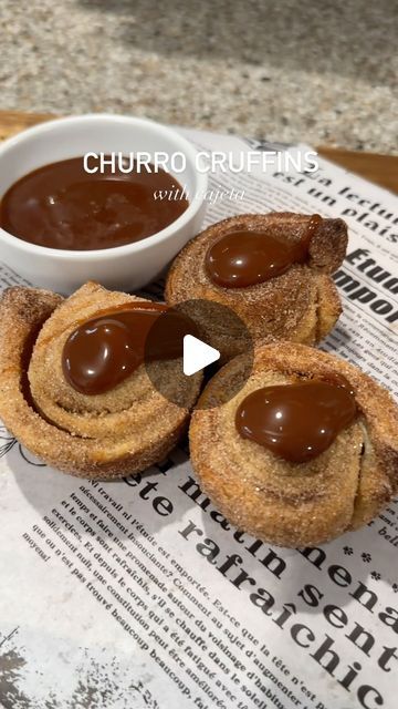 13K views · 1.6K likes | Ivy on Instagram: "Churro cruffins with cajeta 🤍  cruffin=croissant muffin   Cajeta is very similar to dulce de leche. Both made with just sugar and milk. However, cajeta is made with goat’s milk.   Ingredients: 2 puff pastry sheets, thawed but still cold  1/4 cup salted butter  1/2 cup of sugar 1 tablespoon ground cinnamon  *Cajeta or other dipping sauce   Preheat oven to 400 1.Combine sugar and cinnamon until fully combined. 2.Roll out puff pastry sheets on floured surface so they are both the same size.  3.Spread butter on one layer of puff pastry. 4.Cover that with cinnamon sugar mixture. 5.Add second layer of puff pastry on top. 6.Slice puff pastry into strips. I made about 7. 7.Then roll slices cinnamon roll style. 8.Place rolls into greased muffin or cupcak Churro Cruffins, Churro Cruffin, Cruffin Recipe With Puff Pastry, Puff Pastry Cinnamon Twists, Cruffins With Puff Pastry Video, Sugar Puffs, Hispanic Kitchen, Puff Pastry Sheets, Pastry Sheets