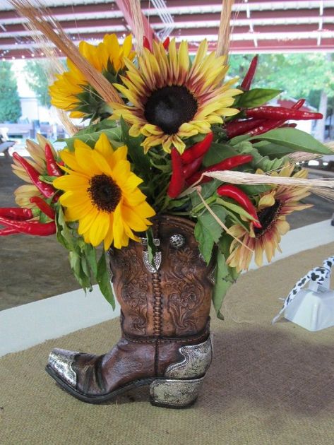 Cowboy Boots These boots aren't just made for walkin'. Description from pinterest.com. I searched for this on bing.com/images Boot Flower Arrangement, Fiesta Mexicana Ideas, Cowboy Boot Centerpieces, Boot Centerpiece, Western Centerpieces, Diy Western, Theme Bapteme, Cowboy Theme Party, Wild West Party