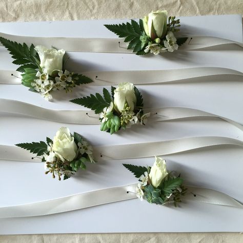 Wrist corsages for the ladies with roses, succulents and greens. #nicolaadamfloral Flowers For Wedding Centerpieces, Fake Flowers For Wedding, White Corsage, Wrist Corsage Wedding, Flower Factory, Wrist Corsages, Flowers For Wedding, Red Rose Wedding, Corsage Prom