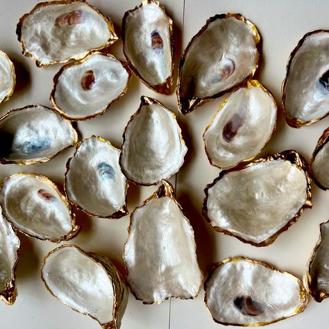 Cape Cod Recycled Repurposed Oyster Shells Made Into Beautiful Ring Trinket Dishes Perfect Gift Or Use In Your Coastal Wedding Each Oyster Is Hand Picked Carefully Cleaned Sealed Painted And Gift Boxed I Have Clear Ones And Pearl Painted Trimmed With Gold And Back Is Natural I Will Be Listing More Decoupaged Ones As Well Each One Measures 3-4 In Made By Me East Coast Salty Vibes Oyster Shell Trinket Dish, Oyster Wedding, Wedding Cake Display Table, Oyster Shells Decor, Wedding Cake Display, Oyster Shell Crafts, Shell Craft, Pearl Paint, East Coast Wedding