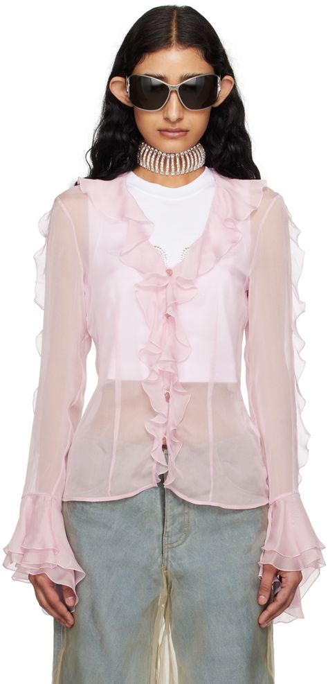 Semi-sheer silk chiffon blouse. Ruffles throughout. · V-neck · Button closure · Darts at front and back · Layered trim at flared cuffs Supplier color: Pink Outfits With Pink Blouse, Sheer Button Up Blouse Outfit, Flowy Blouse Outfit, Ruffle Blouse Outfit, Frilly Tops, Violet Summer, Pink Flowy Top, Solar Punk, Blouse Chiffon