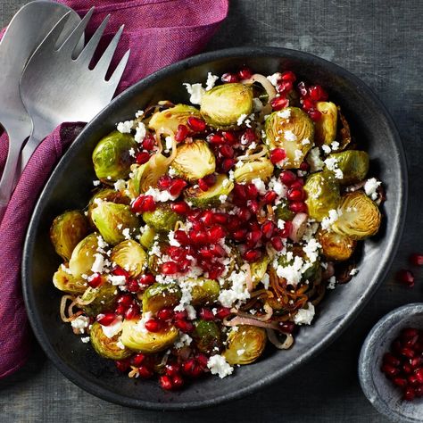 This gorgeous warm salad with nutty roasted Brussels sprouts, sweet-tart pomegranate seeds and creamy goat cheese is perfect for any winter meal--from a weeknight dinner to Christmas dinner or any other holiday celebration. The recipe is easily doubled if you are entertaining a crowd: just be sure to spread the sprouts out (use 2 pans if necessary) so they roast instead of steaming. Thanksgiving Sides Easy, Maple Pecans, Brussel Sprout Recipes Roasted, Pomegranate Recipes, Autumn Side Dishes, Butternut Squash Salad, Sides Easy, Roasted Brussels Sprouts, Sprouts With Bacon