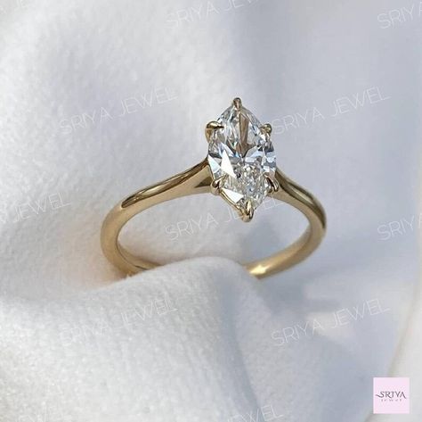 Marquise solitaire ring