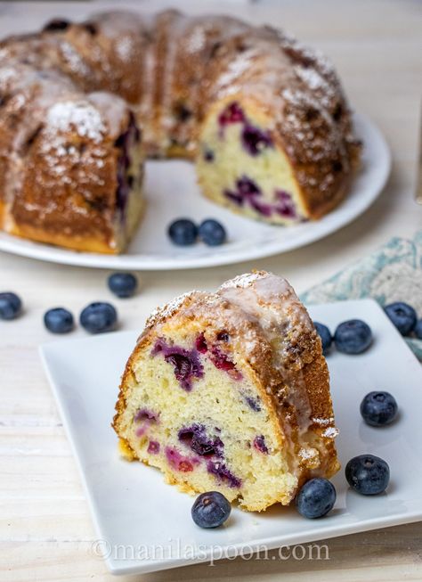 This Blueberry Sour Cream Cake tastes as yummy as it looks! Many have made this cake and are always happy with the result. Have it on its own or drizzle some sweet-tangy lemon glaze on top. Always comes out moist and delish! #blueberrysourcreamcake Blueberry Sour Cream Pound Cake, Blueberry Sour Cream Cake, Coffee Cake Bundt, Blueberry Coffee Cake Recipe, Sour Cream Desserts, Lemon Blueberry Bundt Cake, Blueberry Bundt, Blueberry Desserts Recipes, Blueberry Bundt Cake